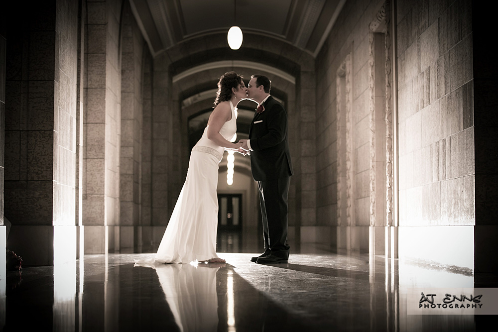 Rayanne and Chris kissing in the halls of the Winnipeg Legislative Building