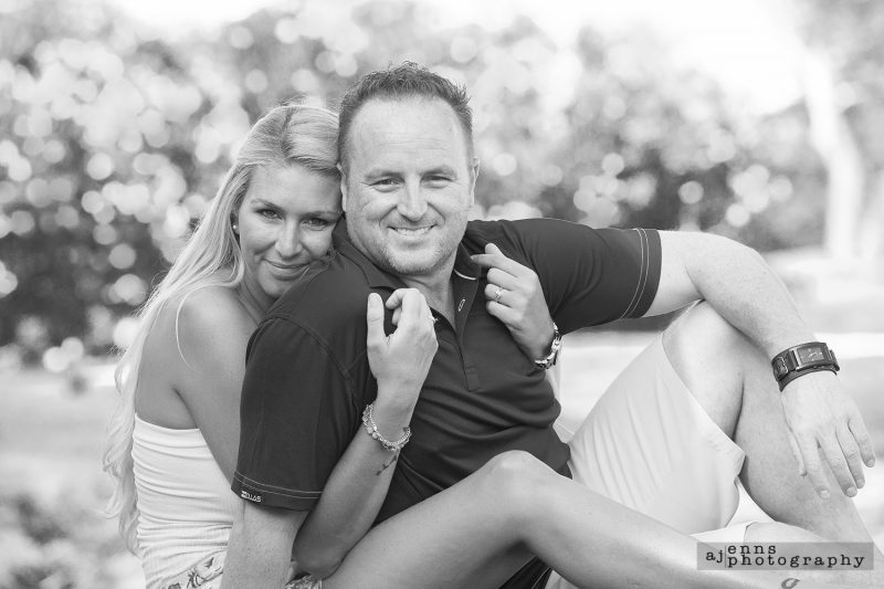 The happy couple posing on a golf course in Playa Del Carmen