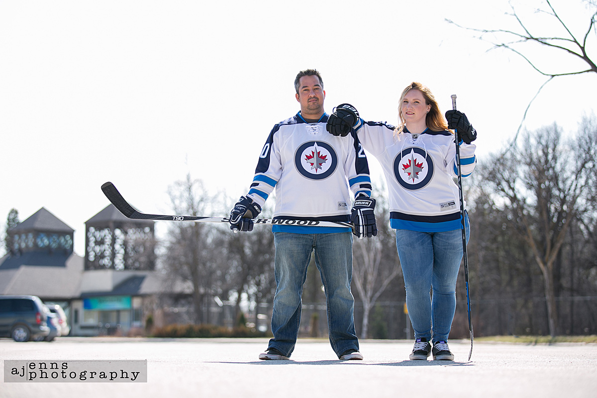 Proudly wearing their Jets jerseys for their engagement photos