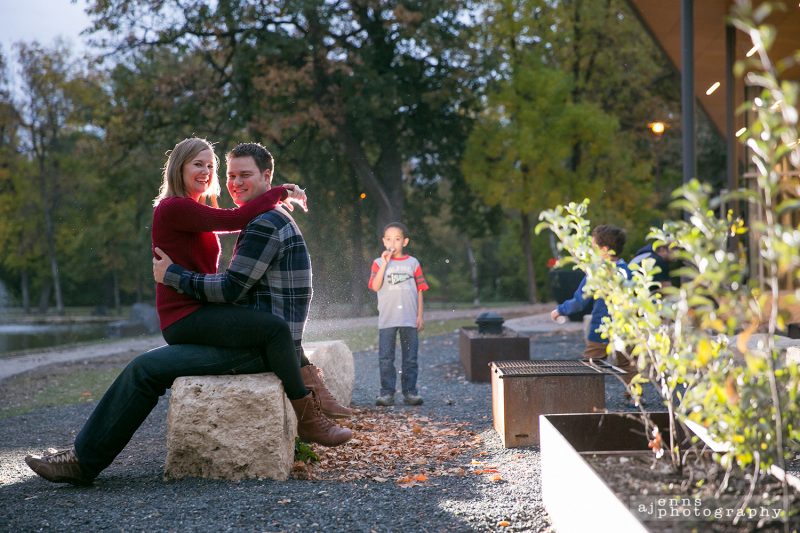 Engagement photos with little boy as on looker