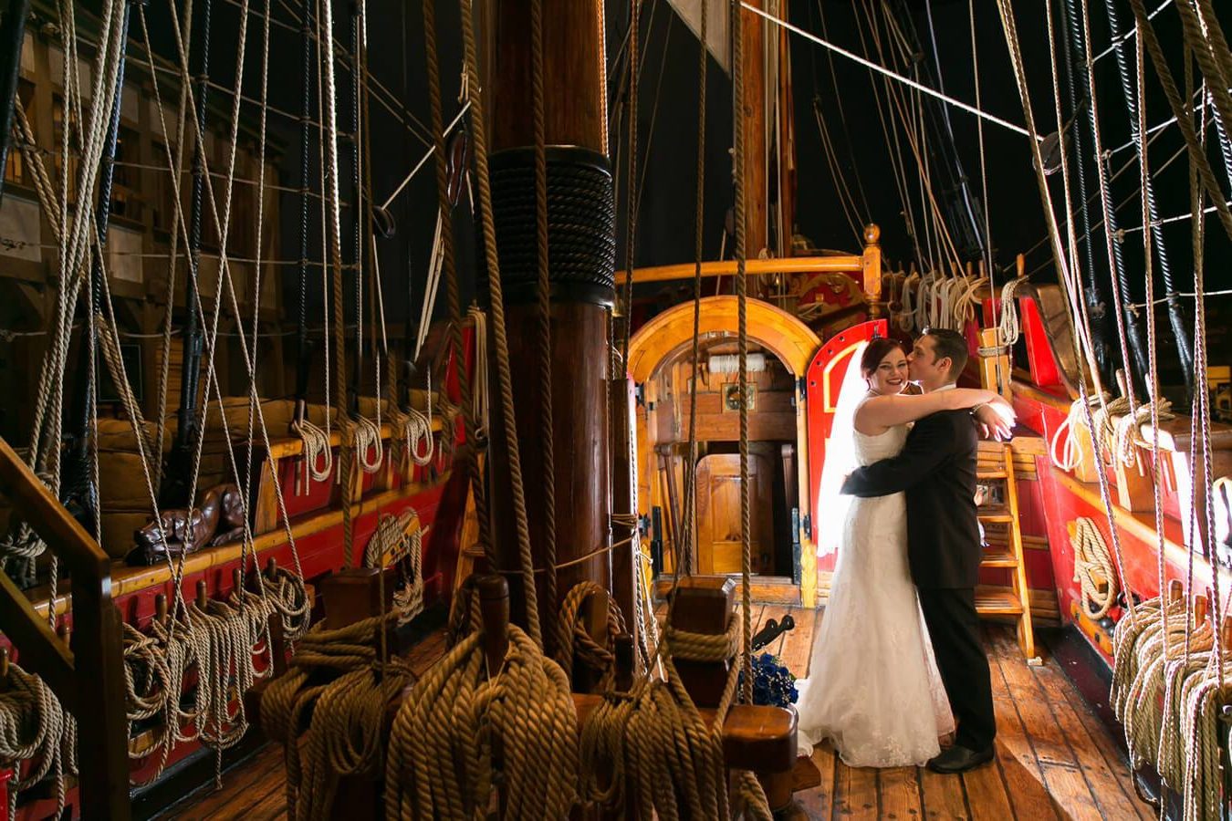 having a kiss on the deck on the deck of the Nonsuch