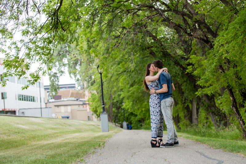 the couple kissing and dancing beside the St.Boniface Hospital