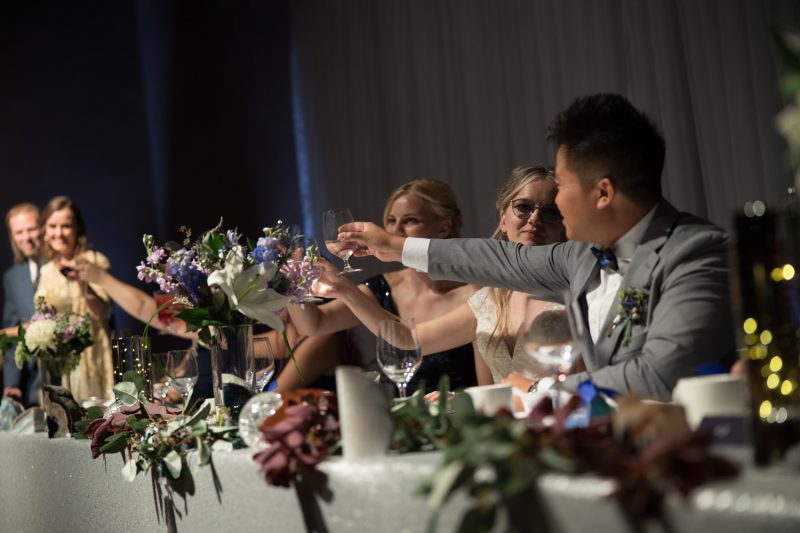 The couple cheersing after a toast