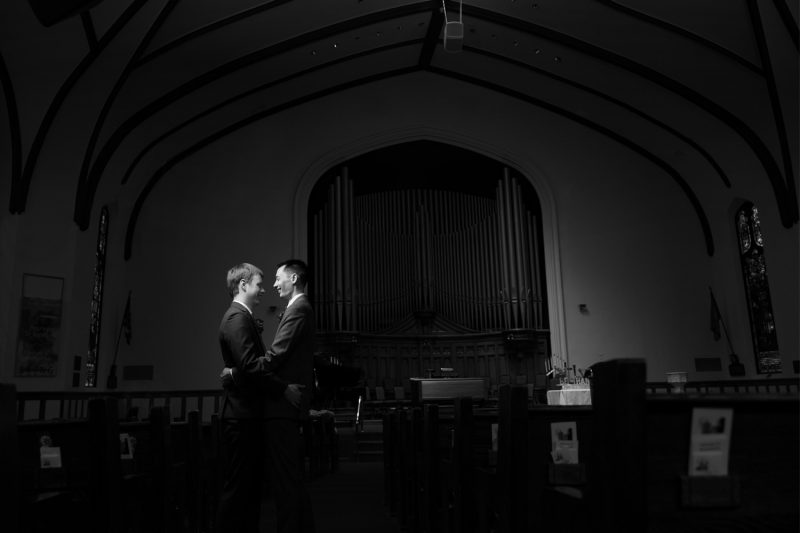 The newlyweds amongst the pews at Westminster Church