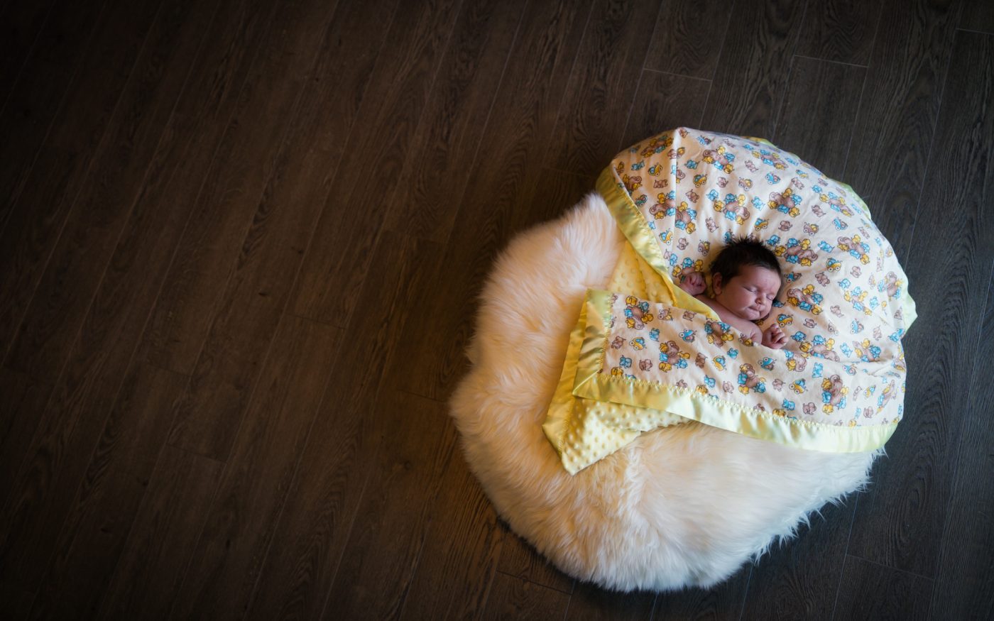 Baby sleeping in Grandmas blanket