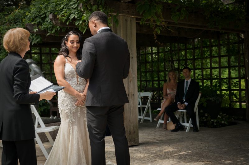 Claudia listening to Matt give her his vows