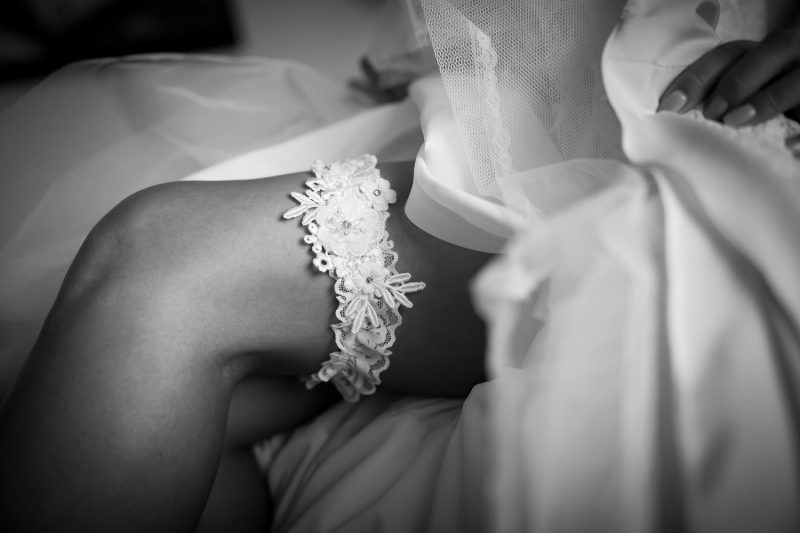 A glimpse at the bride's garter