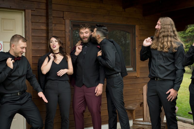 The groomsmen having some fun while getting ready