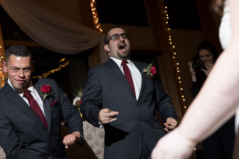 The groomsmen busting a move on the dance floor
