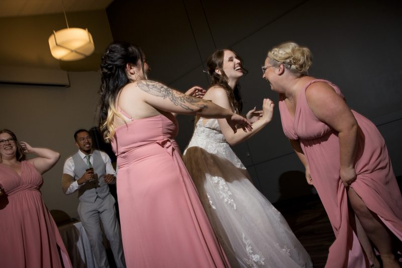 The bride dancing with her girls