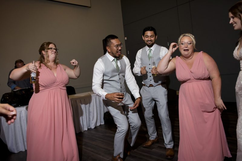 The groomsmen busting a move on the dancefloor
